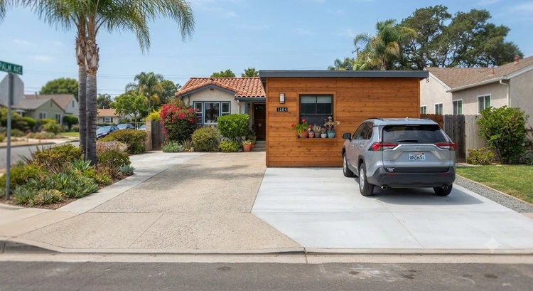 Driveway parking pad added to satisfy garage conversion parking replacement requirement San Jose homeowners must follow